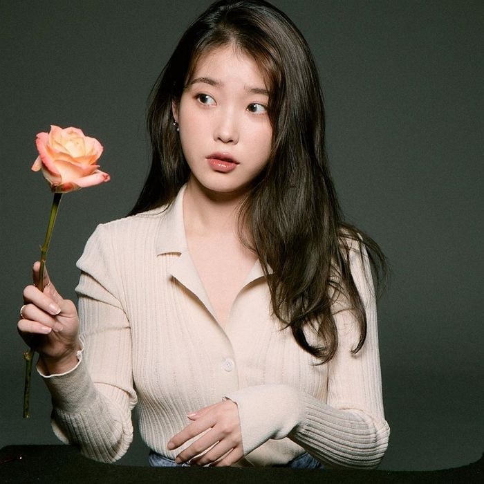 Iu Displays A Pure And Pretty Look While Posing With Flowers Allkpop