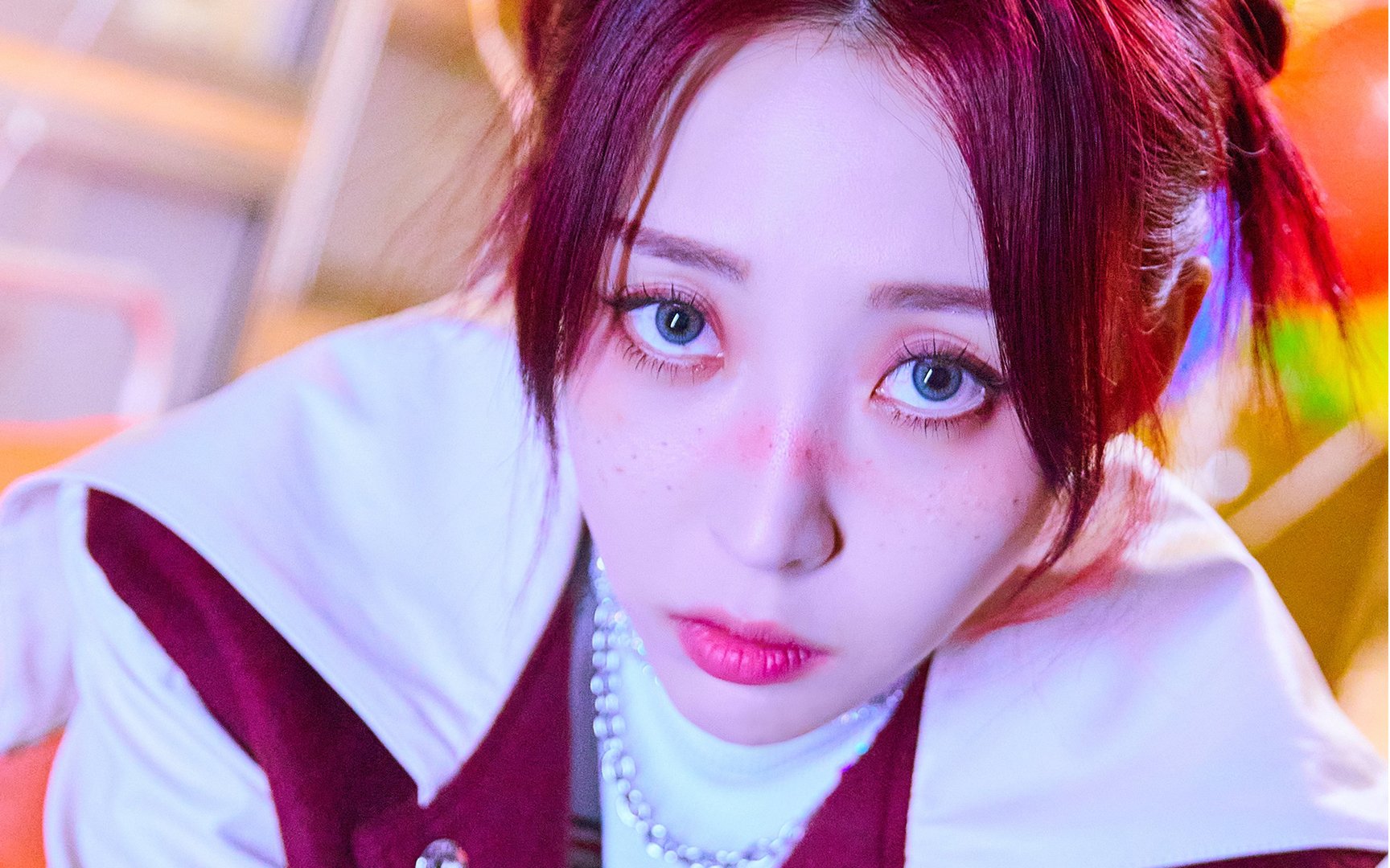 Moon Byul sports red hair and freckles in the cover art for her upcoming  title track 