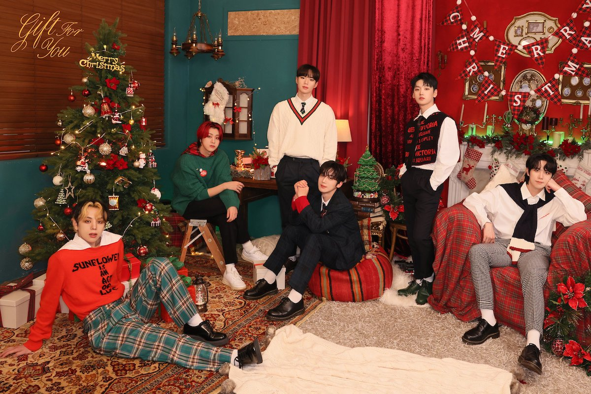 WEi gather around the Christmas tree in concept photos for holiday ...