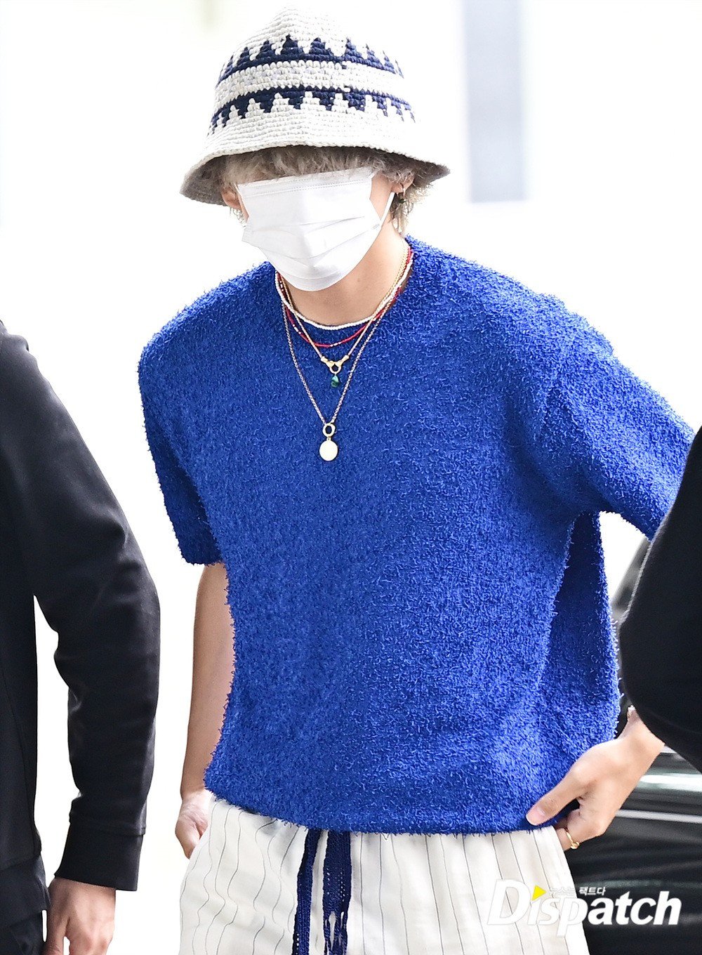 BTS's V (Kim Taehyung) turns heads at the airport with his