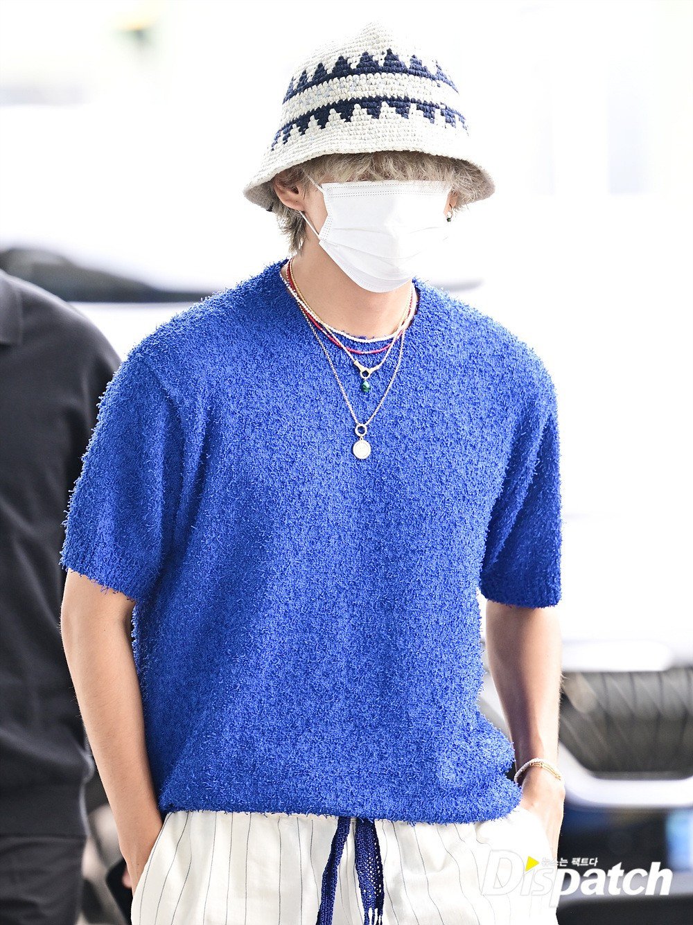 BTS's V (Kim Taehyung) turns heads at the airport with his